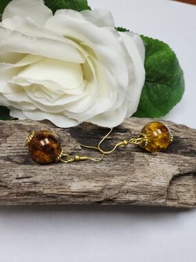 Drop Earrings With Animal Print Acrylic Beads And Gold Toned Accents